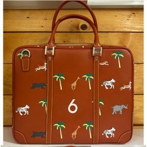 Very troubled child Wes Anderson Darjeeling briefcase